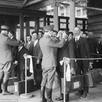 inspection of health at ellis island 1920s.jpg