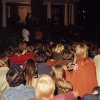 Students gather at night